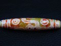 ヴィンテージ：「九眼」（右下がり）西蔵（チベット）天珠 直径約12×56.5mm